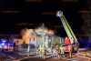 Zimmer gerät in Wohnhaus in Brand: Löscharbeiten gestalten sich schwierig