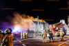 Zimmer gerät in Wohnhaus in Brand: Löscharbeiten gestalten sich schwierig