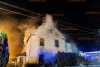 Zimmer gerät in Wohnhaus in Brand: Löscharbeiten gestalten sich schwierig