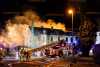 Zimmer gerät in Wohnhaus in Brand: Löscharbeiten gestalten sich schwierig